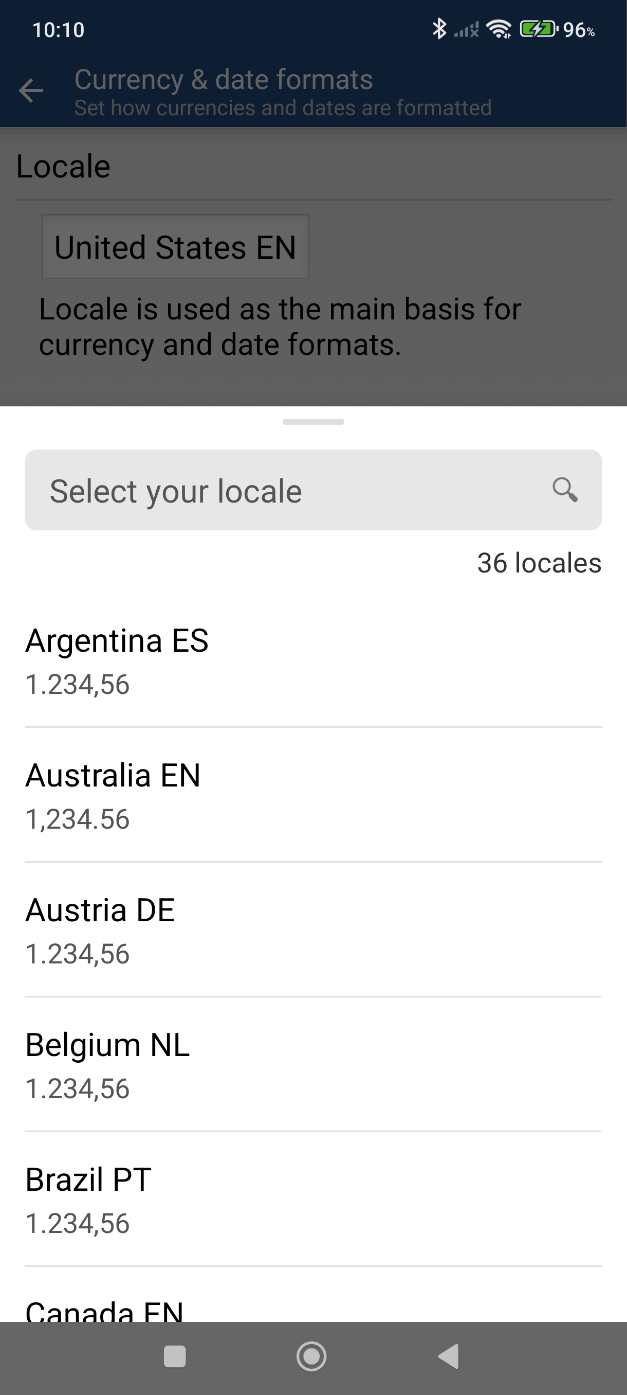 Locale picker showing searchable list of 36 locales with currency formats